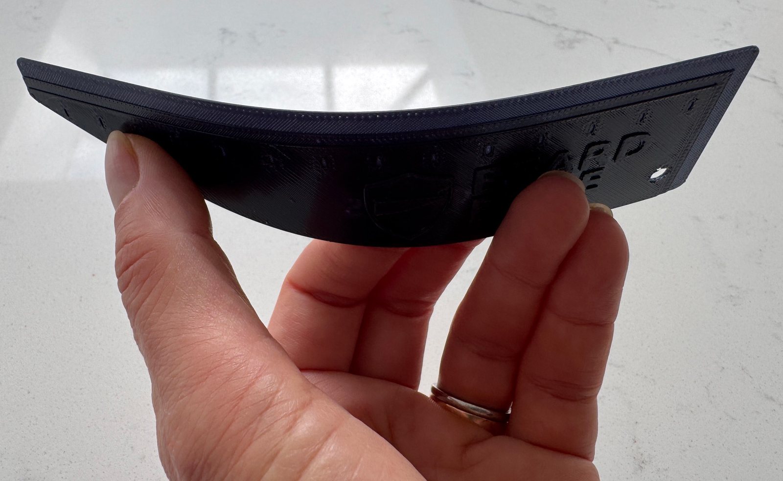 Beard Edge flexing in the hand, thumbnail