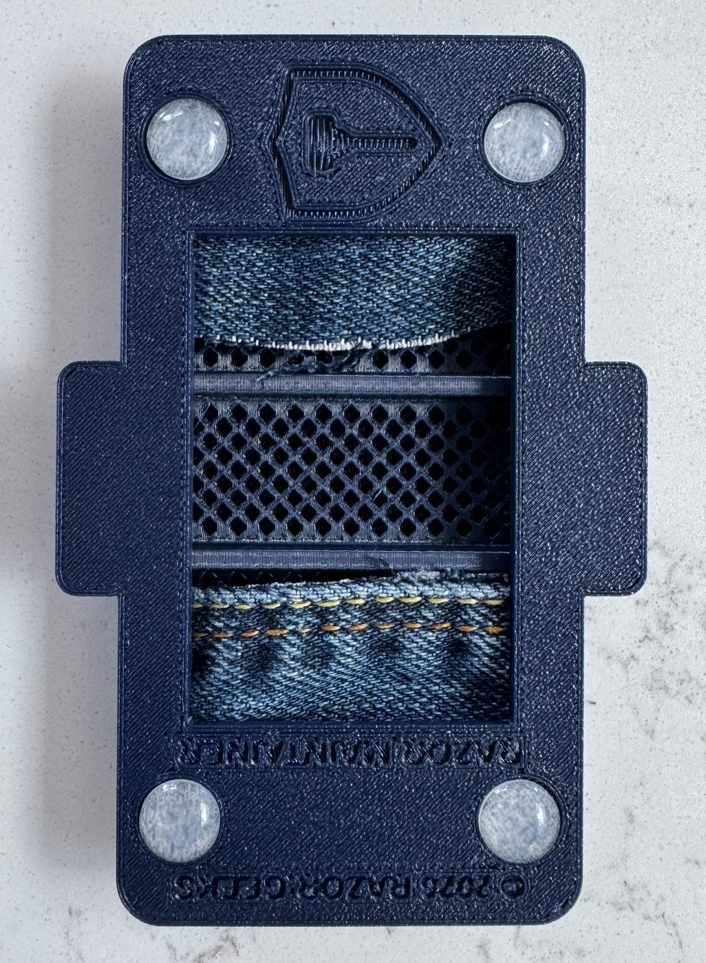 Razor Maintainer underside in Midnight Blue showing base clip and branding, thumbnail