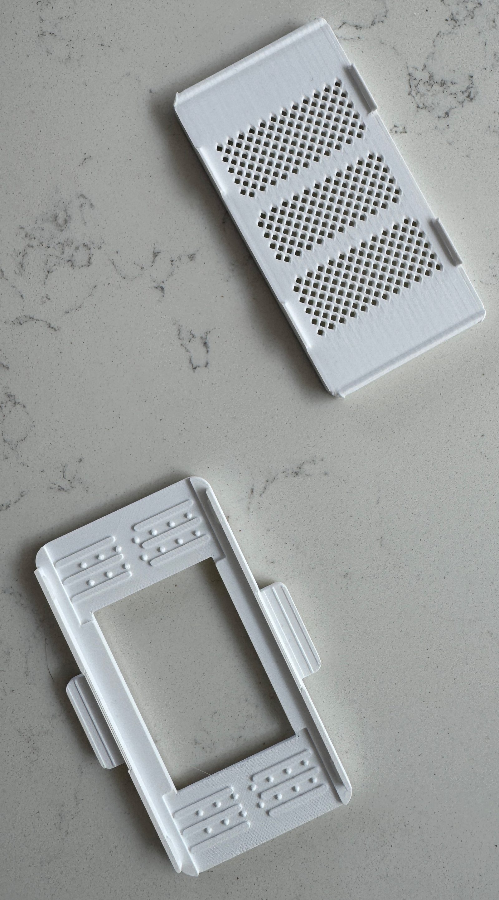 Razor Maintainer bridge and base clip disassembled, thumbnail